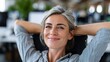 © Iaroslav - Serene young woman smiling, relaxing with arms behind head. Feeling content and confident, taking from work break