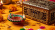 © MuhammadAsad - Indian Diwali festival celebration with lit diya, sweets, and ornate box on yellow cloth