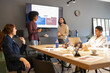 © ADDICTIVE STOCK - Diverse team collaborating in modern office setting
