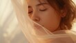 © Future Vision - Resting closeup female closing eyes in studio, wearing sheer veil, warm light, mole, bare shoulders