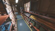 © icetray - In a well lit warehouse, shelves are lined with colorful boxes and tools, creating an efficient storage space. The organized structure allows for easy access to various supplies.