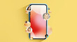 © Prostock-studio - A smartphone is shown with images of different people surrounding it. The background is bright and colorful. This scene represents modern communication and interaction through devices.