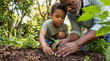 © Aurora Aesthetics - African american grandfather and grandson planting seedling in garden spring growth family connection support black men ecology sustainability copy space earth care
