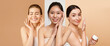 © Prostock-studio - Three women are applying skincare products on their faces in a collage. They are each smiling and enjoying their beauty routine. The setting highlights different skin tones and routine steps.
