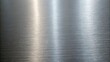 © Alam - Brushed metal texture displays a gradient of light and shadow creating a sleek appearance