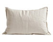 © Vii - A white pillow sits on top of a white table, perfect for decorating or as a prop