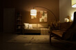 © Pixel-Shot - Interior of stylish living room with cozy sofa, armchair and glowing lamps at evening