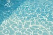 © afdal - Rippling clear blue water reflecting light, creating bright, abstract patterns on the surface