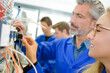 © auremar - Closeup of female apprentice electrician