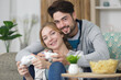 © auremar - young attractive cute couple playing online video game