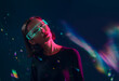 © VISTA by Westend61 - Glowing virtual reality glasses with light effects indoors