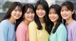 © Stingray_Japan - カラフルな衣装で笑顔を見せる5人の日本人女性アイドルグループ