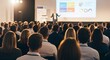 © FQ Visuals - Audience attending conference seminar in modern hall representing education training business presentation and professional development