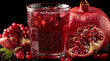 © Jack - Pomegranate juice in glass on black background. Pomegranate arils and halves. Healthy antioxidant drink. Pomegranate juice and seeds. Pomegranate juice drink.