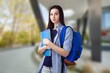 © BillionPhotos.com - Smiling female student enjoying school life