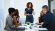 © JamDay/peopleimages.com - Business woman, team and presentation in office for funding pitch, investment and planning. Presenter, group and employee in meeting for finance project, explain and question with equity discussion