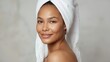 © LimeSky - Image of an attractive young woman with a towel on her head against a backdrop.jpeg