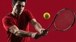 © olga_demina - Male tennis player displaying intense concentration and athletic effort, executing a powerful forehand stroke with a racket and tennis ball in motion against a minimalist red backdrop