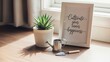 © Alynsyd - Succulent plant with watering can and frame on wooden desk
