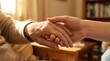 © AspctStyle - Young caring hands gently holding elderly wrinkled hands in warm indoor light, symbolizing compassion, support, and intergenerational bond.