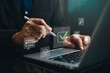 © panya7 - Hand using stylus on laptop with digital checkmark and checklist icon, representing approval workflow, task completion, compliance review, quality control, verification process, business management.