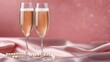 © Галя Дорожинська - Two tall champagne flutes filled with sparkling wine sit on pink satin, creating a festive vibe