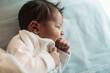 © Antonio Recena - Newborn baby boy sleeping in crib