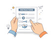 © Coosh448 - Instruction Sheet Focus. Reading instructions ? focused preparation. Close-up editorial scene of hands holding an instruction sheet, careful attention to