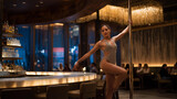 Positioned in a modern bar, the pole dancing stage hosts nightly shows where performers dazzle the audience with their impressive choreography and artistry, transforming ordinary nights into
