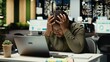 © DC Studio - Black restless weary woman experiencing burnout and fatigue late at night, being overwhelmed and overworked at desk. Anxious fatigued person struggling with mental haze, discomfort. Camera B.