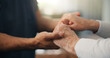 © WesJVR/peopleimages.com - Caregiver, holding hands and comfort with senior person in home for empathy, support and medical results. Nurse, consoling or elderly patient for reassurance, healthcare diagnosis and assisted living