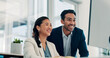 © SparkPix/peopleimages.com - Laughing, employees and people with computer, office or risk assessment on web, research and success. Investment bankers, reading and team with tech for financial analysis and happy for achievement
