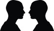 © ridwanhassan - Silhouette of two human heads facing each other in profile view, symbolizing communication, confrontation, or relationship dynamics