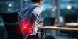 © Vasiliy - Businessman sitting at office desk late at night suffering from acute lower back pain