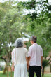 © mojo_cp - Asian elderly couple happy together in park environment