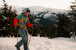© Zedspider - Mountaineer backcountry ski walking ski alpinist in the mountains. Ski touring in alpine landscape with snowy trees. Adventure winter sport. Low Tatras, slovakia