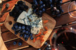 © svittlana - Rustic Gourmet Snack Board with Cheese and Fresh Fruit
