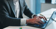 © Azeemud25/peopleimages.com - Hands, business and man in office, laptop for online reading and checklist for revenue audit. Person, accountant and employee with pc, email for funds management and feedback for finance compliance