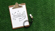 © Vivid_Vision - Coach clipboard with tactical game plan diagram and whistle