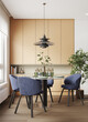 © Victor zastol'skiy - Vertical 3D render of modern dining room with blue chairs and beige cabinets. Interior design