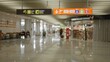 © Krakenimages.com - Blurry view of an airport terminal with defocused signs and passengers, highlighting a bustling international travel hub with a modern, spacious interior.