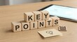 © StocksJust4You - Wooden blocks spelling 'Key Points' on desk