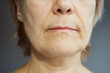© evafesenuk - Close-up part of the face of a mature woman.
