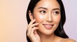© Eva - Serene Asian Woman Smiling Naturally, Showcasing Radiant Skin and Confidence in a Studio Setting