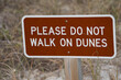 © David Gales - Close up of Sign at Beach Asking People to Not Walk on the Sand Dunes