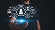 © sultan - Online Education Platform: Student holding smartphone with glowing e-learning icons, virtual graduation cap and brain symbols, digital classroom and global distance learning technology concept