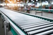 © Malika - Industrial Conveyor Belt Ready for Operation in Modern Production Facility