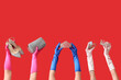 © Pixel-Shot - Female hands with accessories on red background. Prom concept