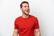 © luismolinero - Young caucasian man isolated on white background laughing