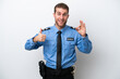 © luismolinero - Young police caucasian man isolated on white background showing ok sign and thumb up gesture